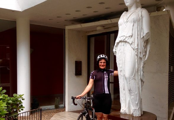 Elain Harwood in cycling kit at the entrance of Highpoint
