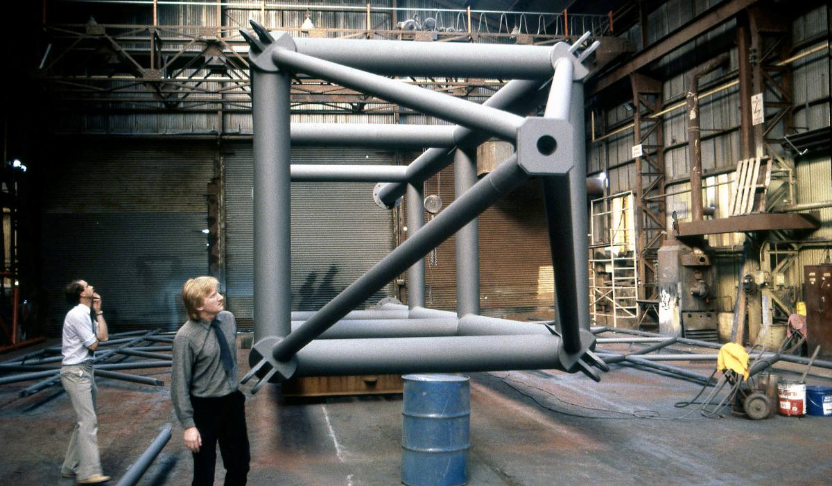 Construction of the structural 'trees' that rise from the undercroft through the concourse floor at the Gatwick Airport. Photo courtesy Foster and Partners. 